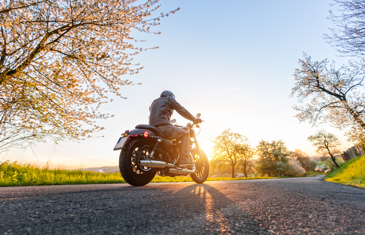 motorcyclist taking a spring drive 