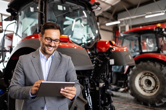 Professional seller selling agricultural machines and farming equipment.