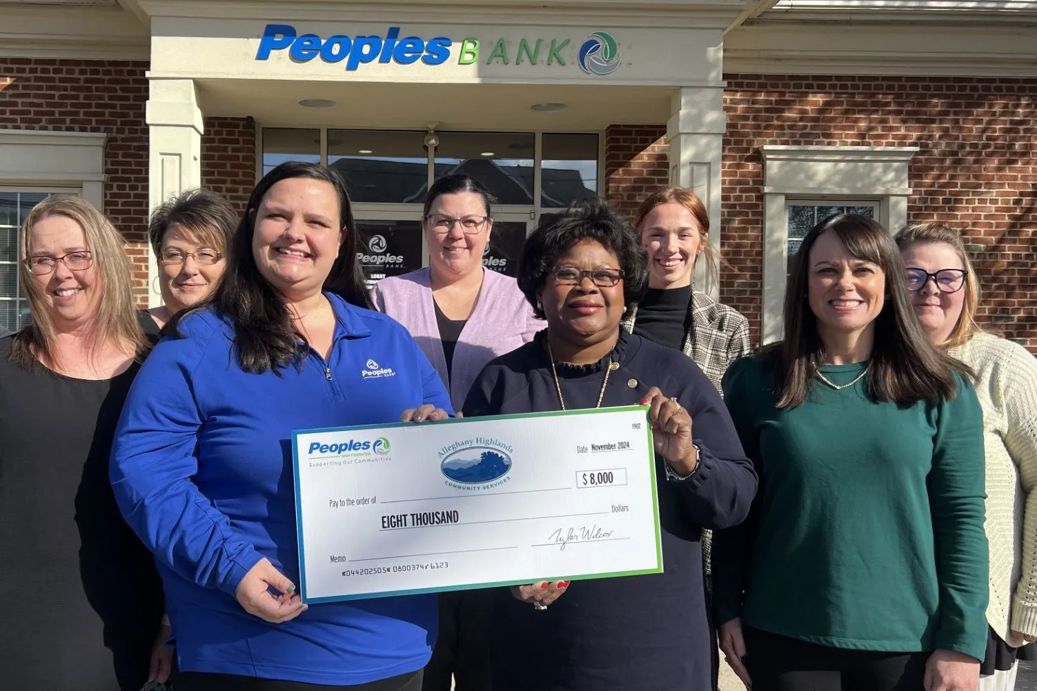 The Peoples Bank Foundation presents a $8,000 donation to a representative of the Allegheny Highlands Community Services.