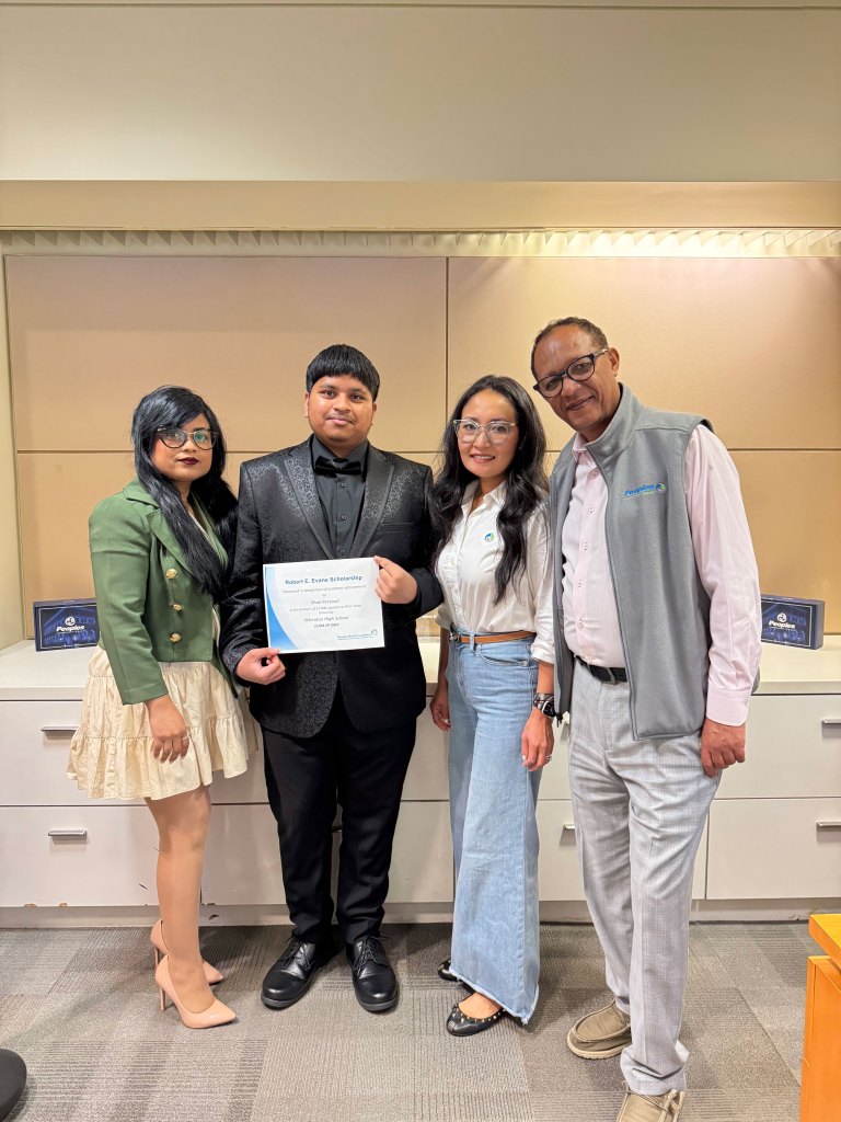 Three Peoples Bank associates present the Robert E. Evans scholarship to a high school student in Washington D.C.