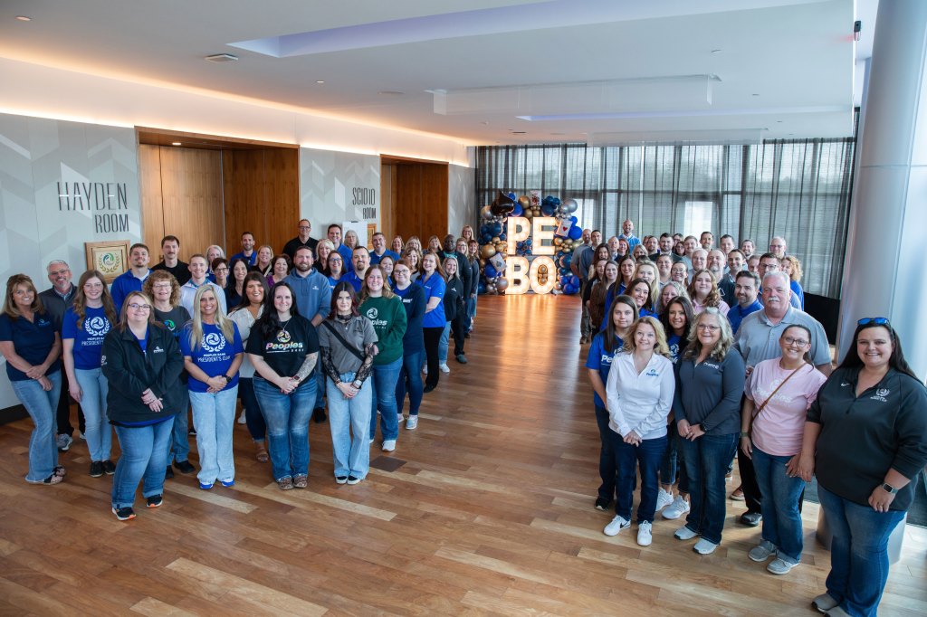 One hundred Peoples Bank associates pose for a photo at the Spring 2026 President's Club Award Ceremony.